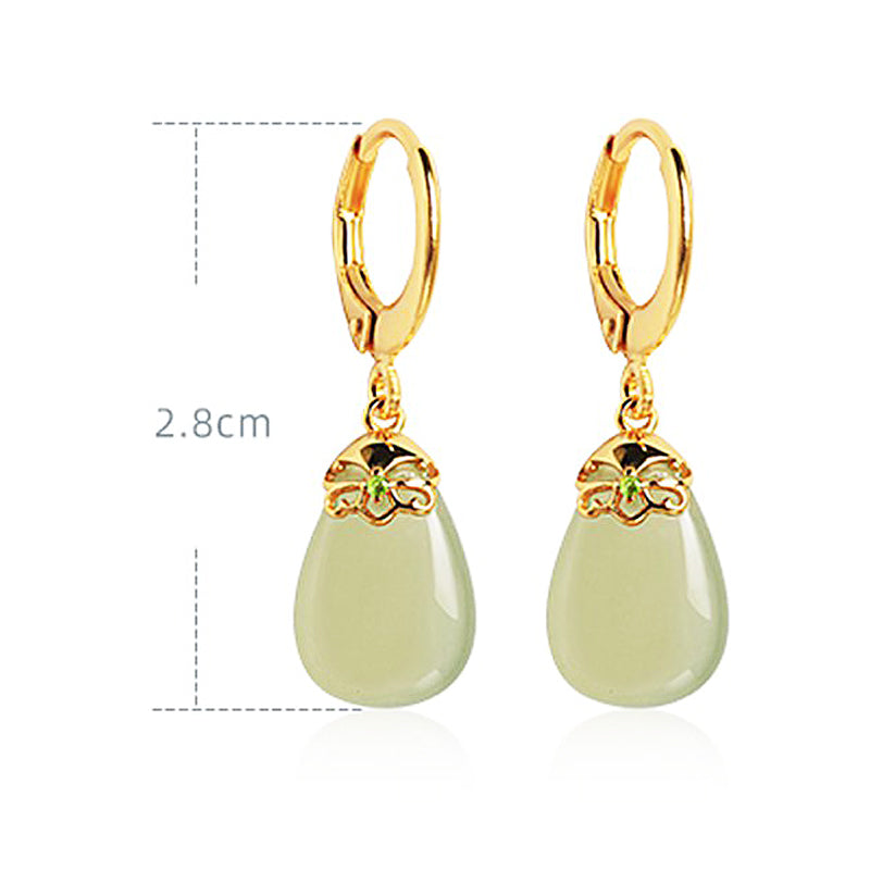 Green jade pendants earrings, paired display