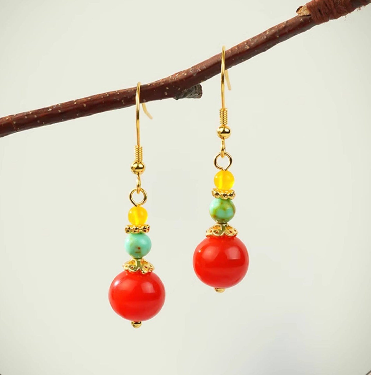 Zodiac-inspired statement earrings earrings, paired display