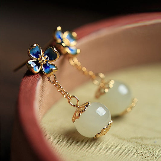 Four-leaf green jade-style earrings with a delicate Chinese-inspired design