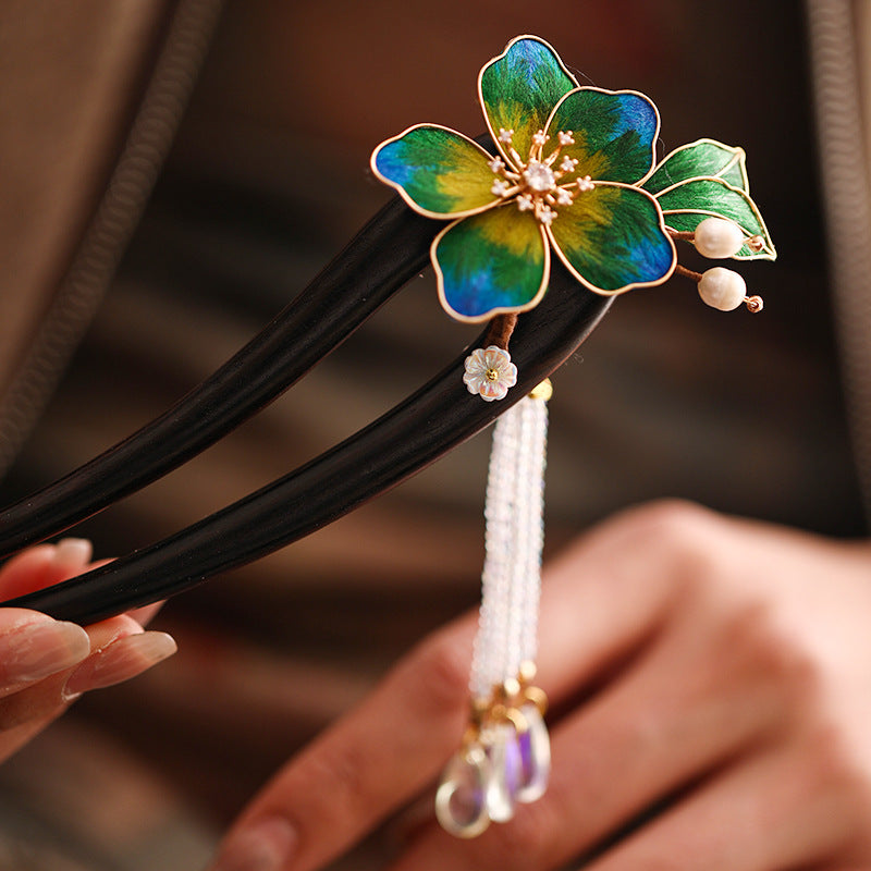 Detail of layered petal motif with subtle enamel highlights and sheen