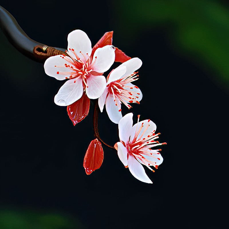 Side view showing floral carved detail and smooth polished surface