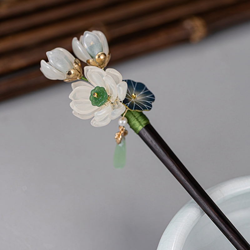Close-up of lotus-shaped hair stick top in warm brown tone