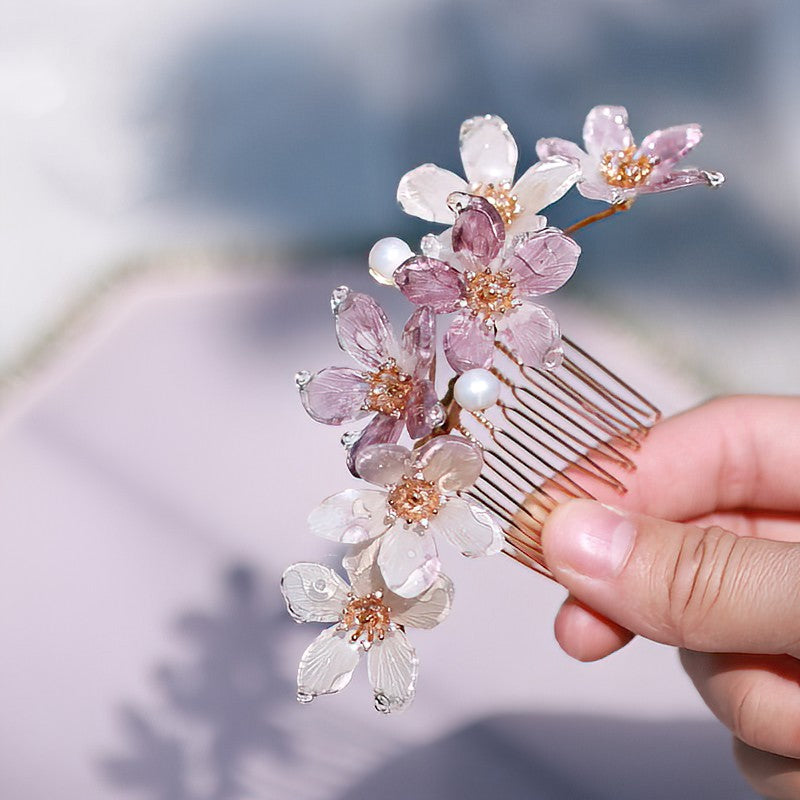 Close-up of delicate petal detailing with subtle metallic highlights on stick