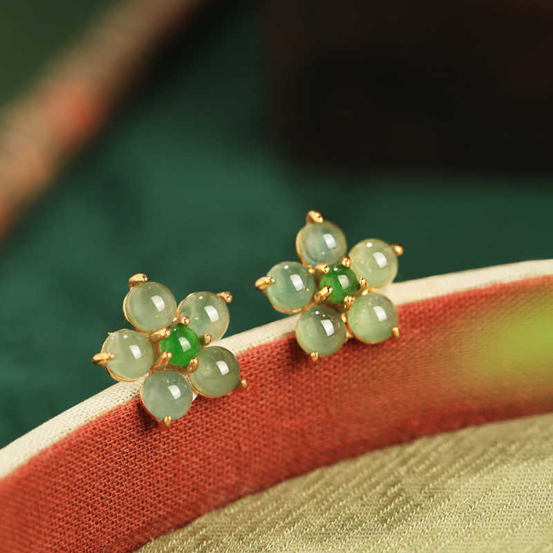 Soft green floral studs earrings, side profile