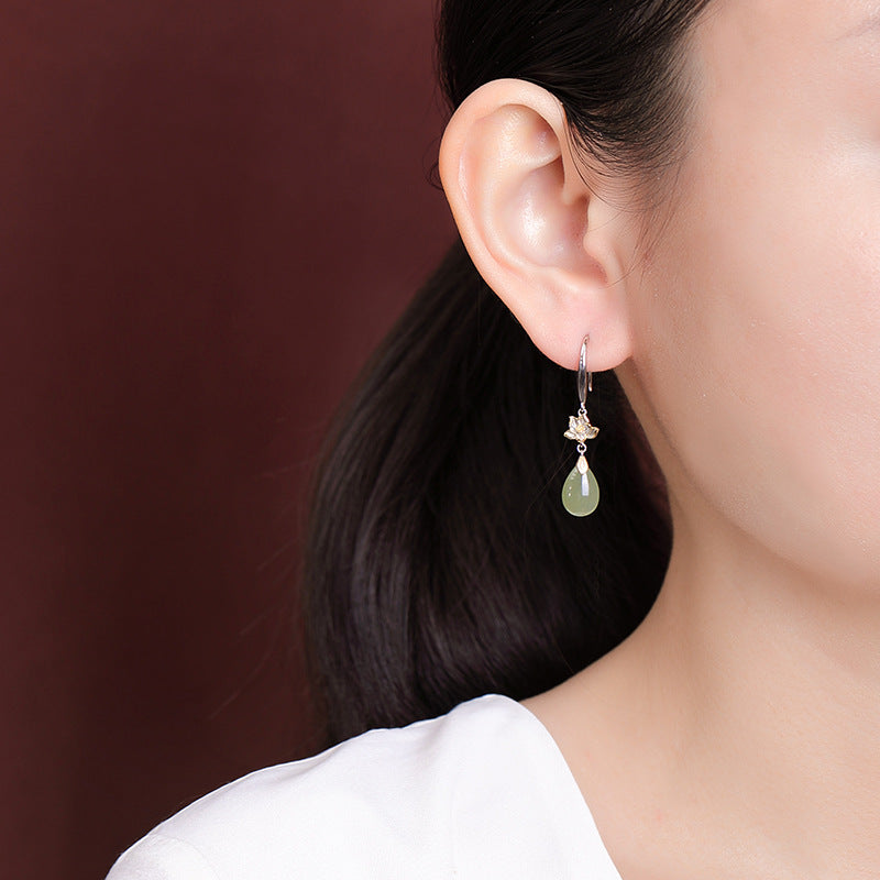 Lotus flower hook drops earrings, close detail