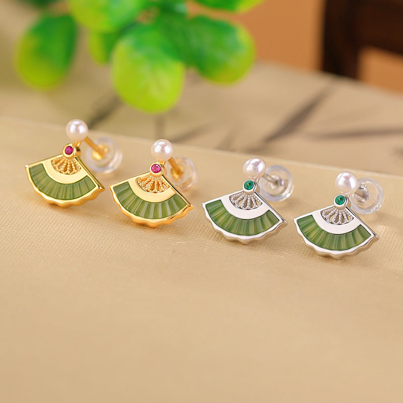 Openwork green studs earrings, front view