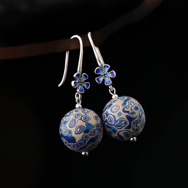 Bold lacquer-style earrings earrings, worn styling view
