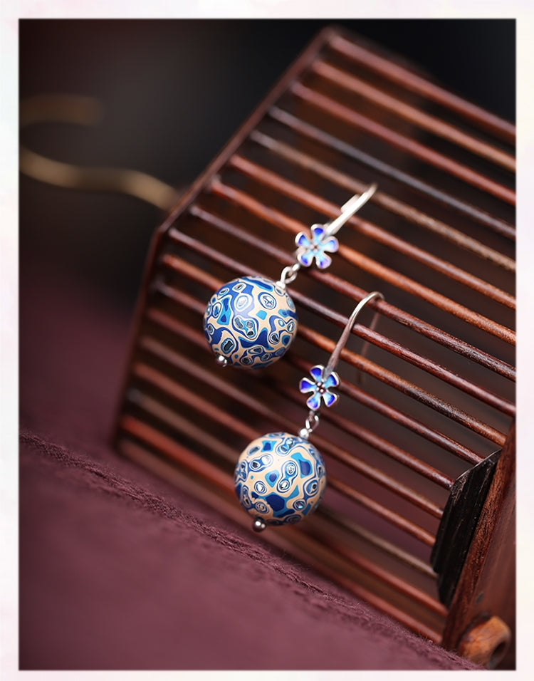 Bold lacquer-style earrings earrings, paired display