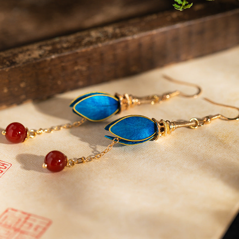 Vintage-style pendant drops earrings, close detail