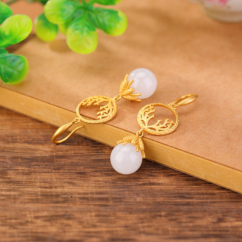 Openwork jade-style drops earrings, worn styling view