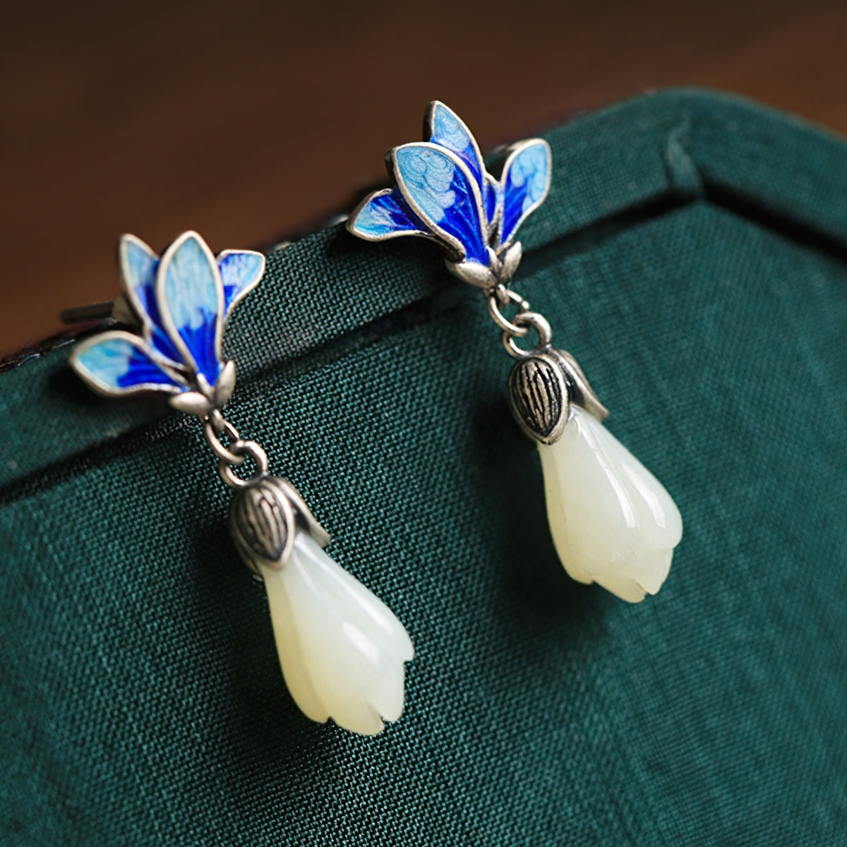 Magnolia jade-style drops earrings, front view