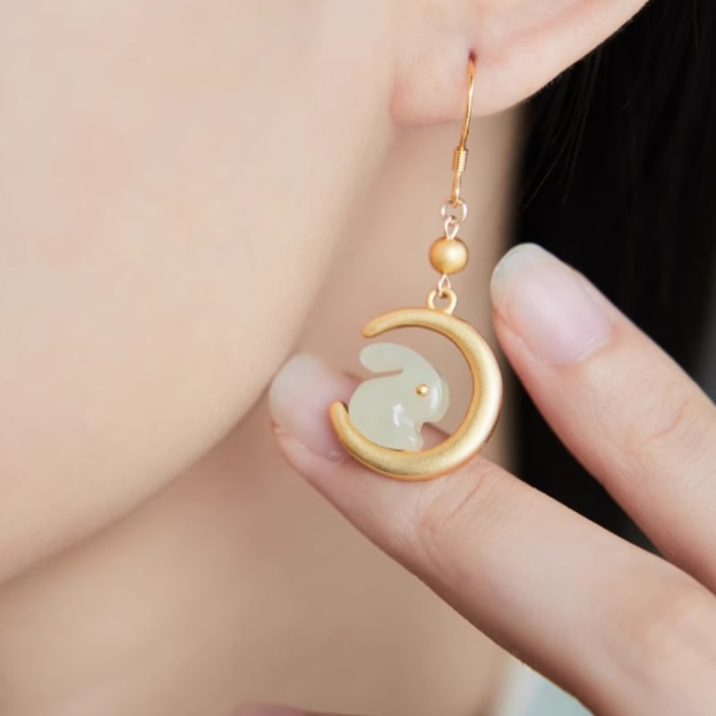 Rabbit motif jade-style drops earrings, worn styling view