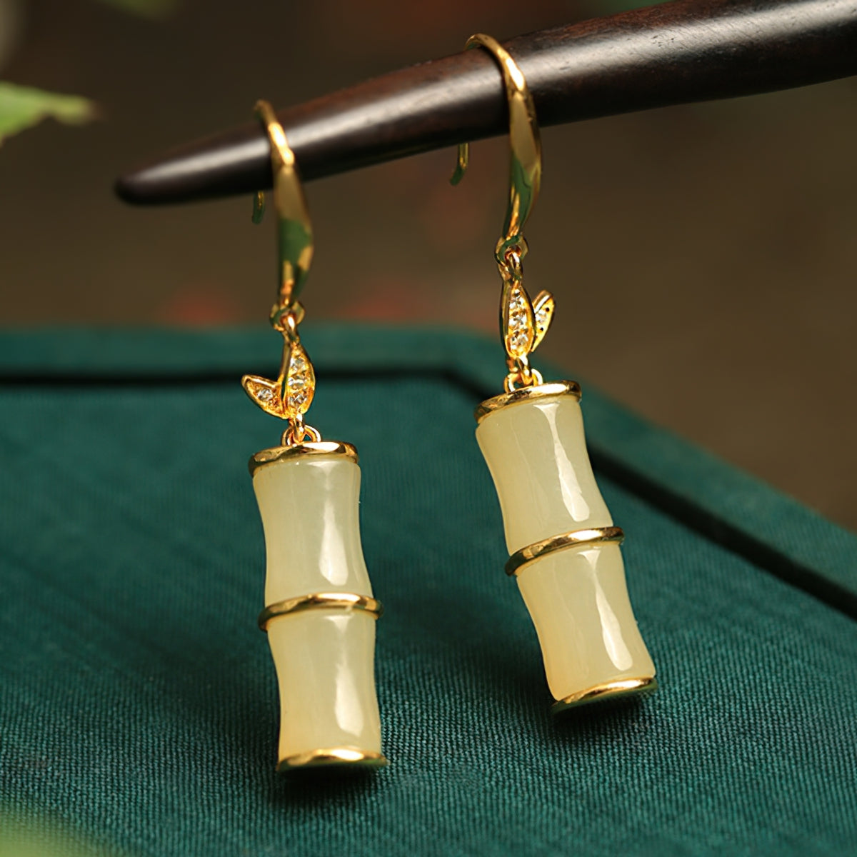 Bamboo jade-style drops earrings, worn styling view