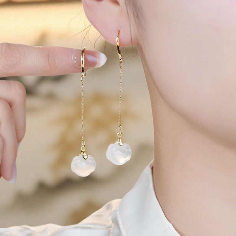 White stone ruyi drops earrings, front view