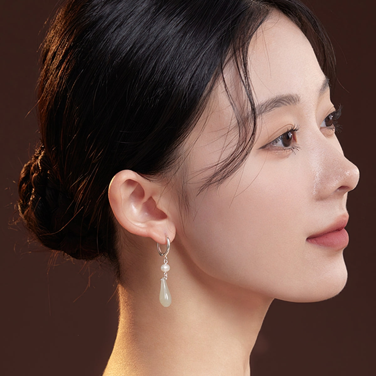 Elegant jade-style dangles earrings, close detail