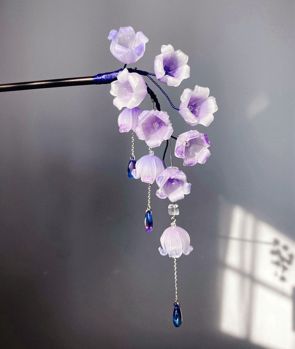 Side angle showing blossom detail and smooth tapered stem on stick