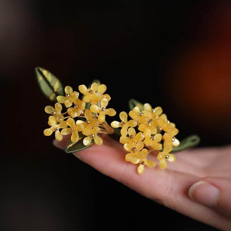 Close-up of blossom detail showing textured petals and tiny beads