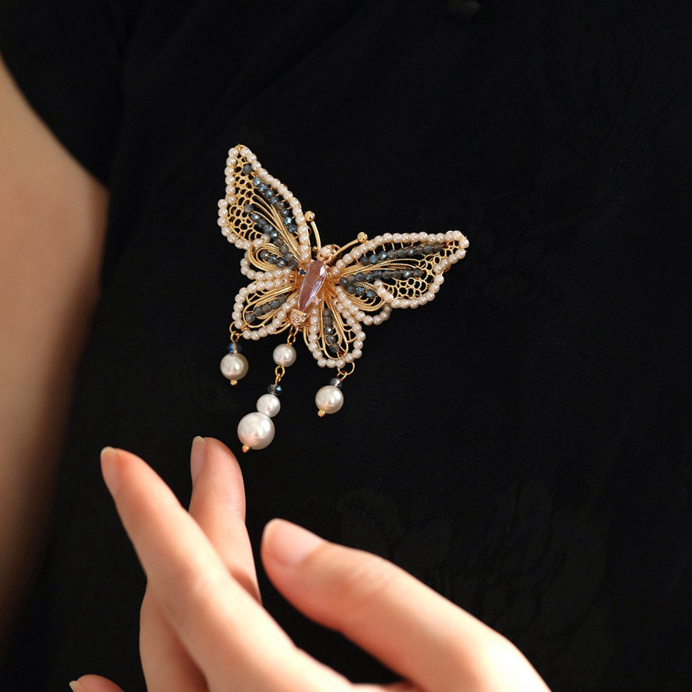 Brooch displayed on neutral fabric with outfit suggestions for daily wear
