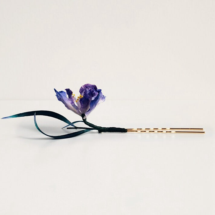 purple iris brooch pin styled on a blazer styled for an occasion