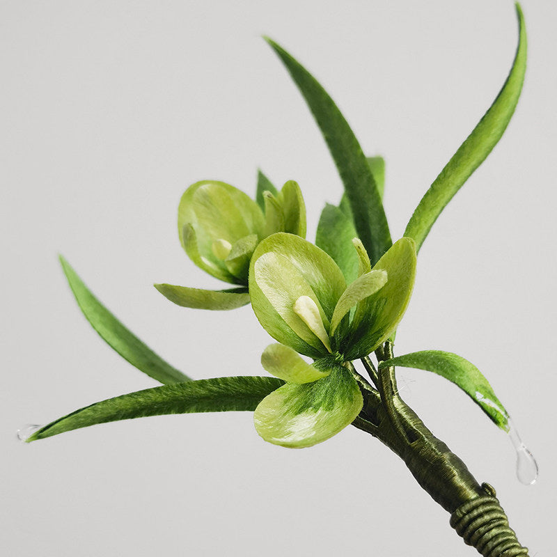 Close-up of floral detail, textured petals and subtle sparkling accents