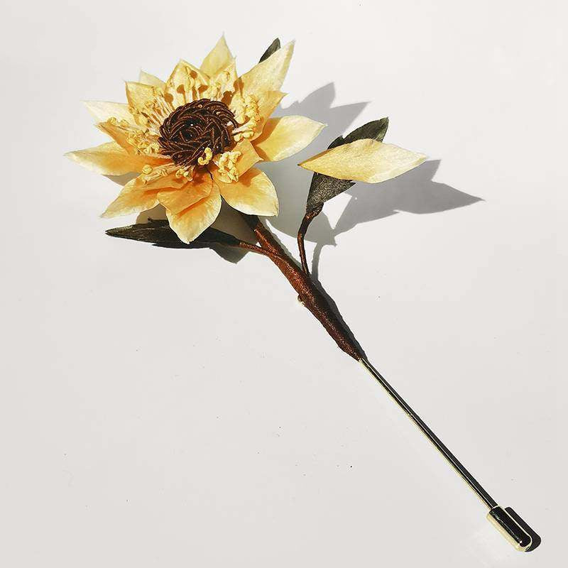 sunflower brooch pin styled on a sweater