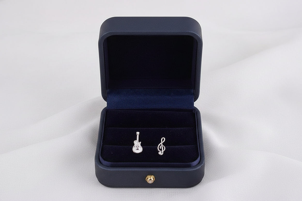 Artisan S925 sterling silver guitar music note stud earrings, unique handmade jewelry gift for musicians and music lovers.