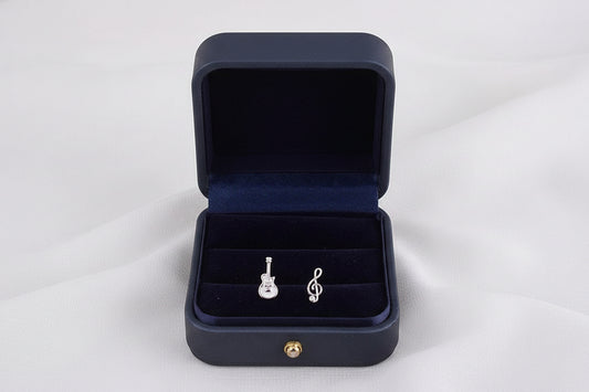 Artisan S925 sterling silver guitar music note stud earrings, unique handmade jewelry gift for musicians and music lovers.