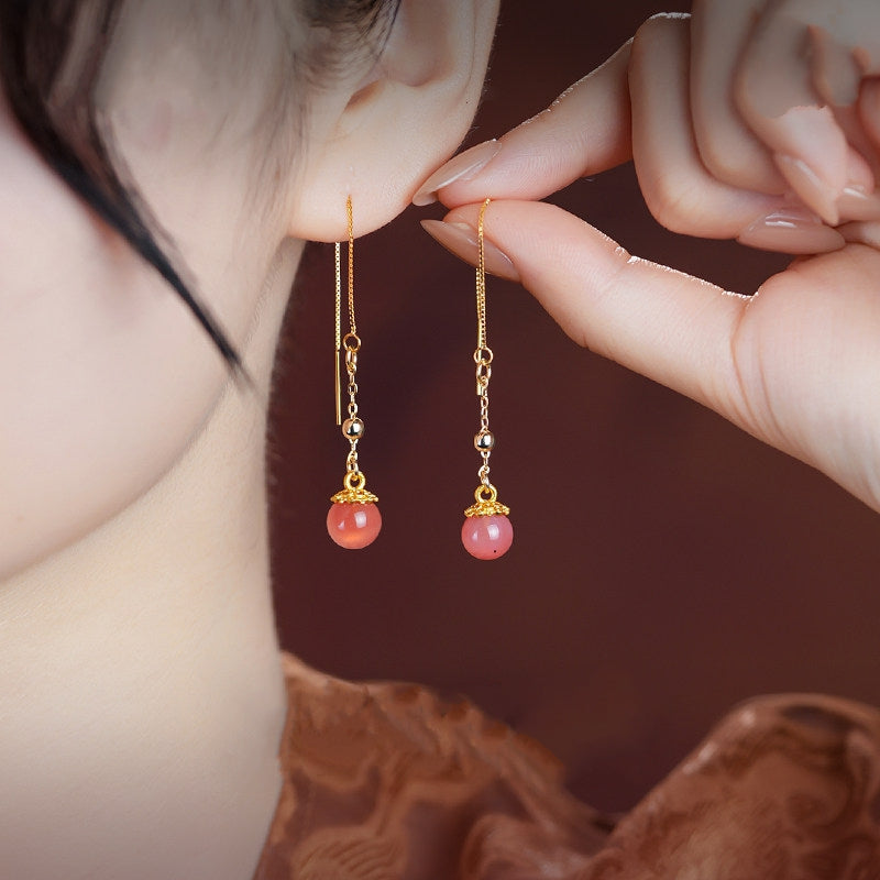 Pink stone dangles earrings, side profile