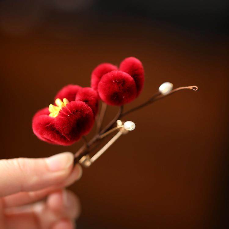 Side profile highlighting plush depth and a secure clasp fastening on lapel