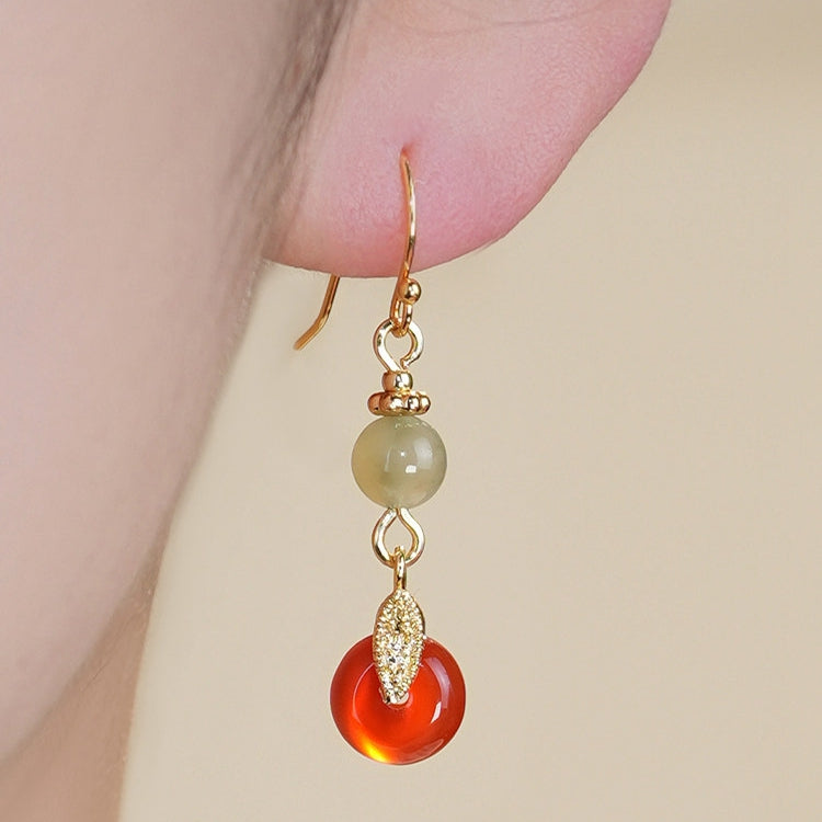 Red and green bead drops earrings, worn styling view