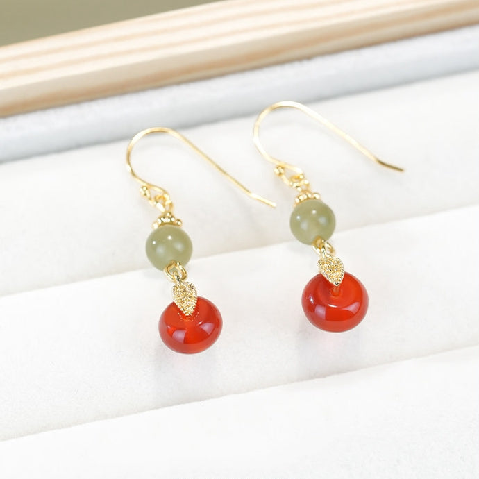 Red and green bead drops earrings, paired display