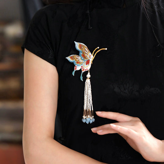 tassel butterfly brooch pin on a Qipao