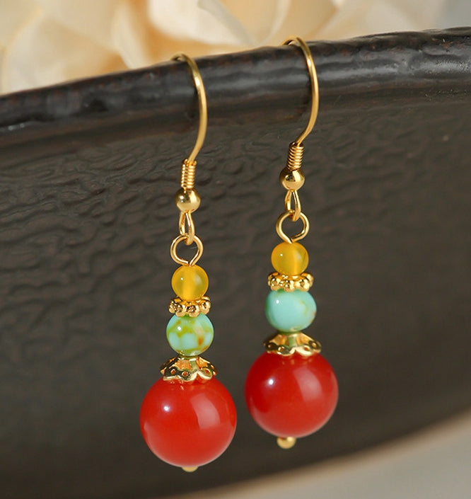 Zodiac-inspired statement earrings earrings, side profile